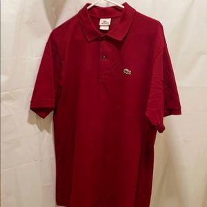Lacoste polo.... maroon in color